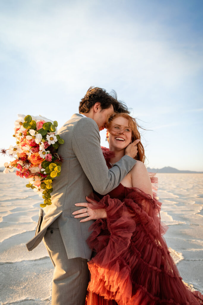 Joyful newlyweds lost in the moment during their Salt Flats wedding shoot