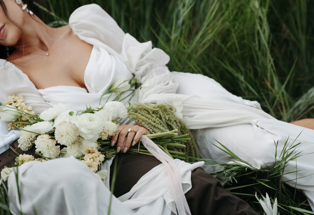 Yosemite elopement detail: ring and bouquet in romantic close-up