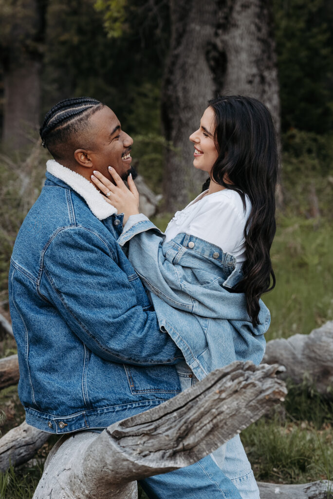 Intimate Yosemite engagement session with couple on log