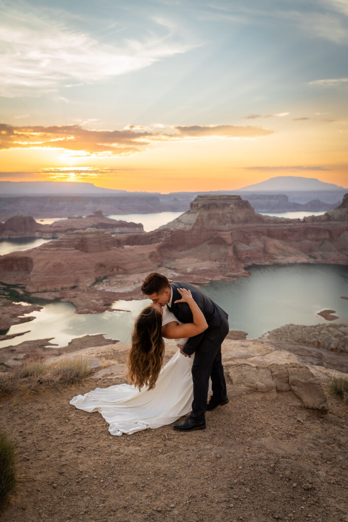 Intimate sunset kiss overlooking the cliffs of Alstrom Point.