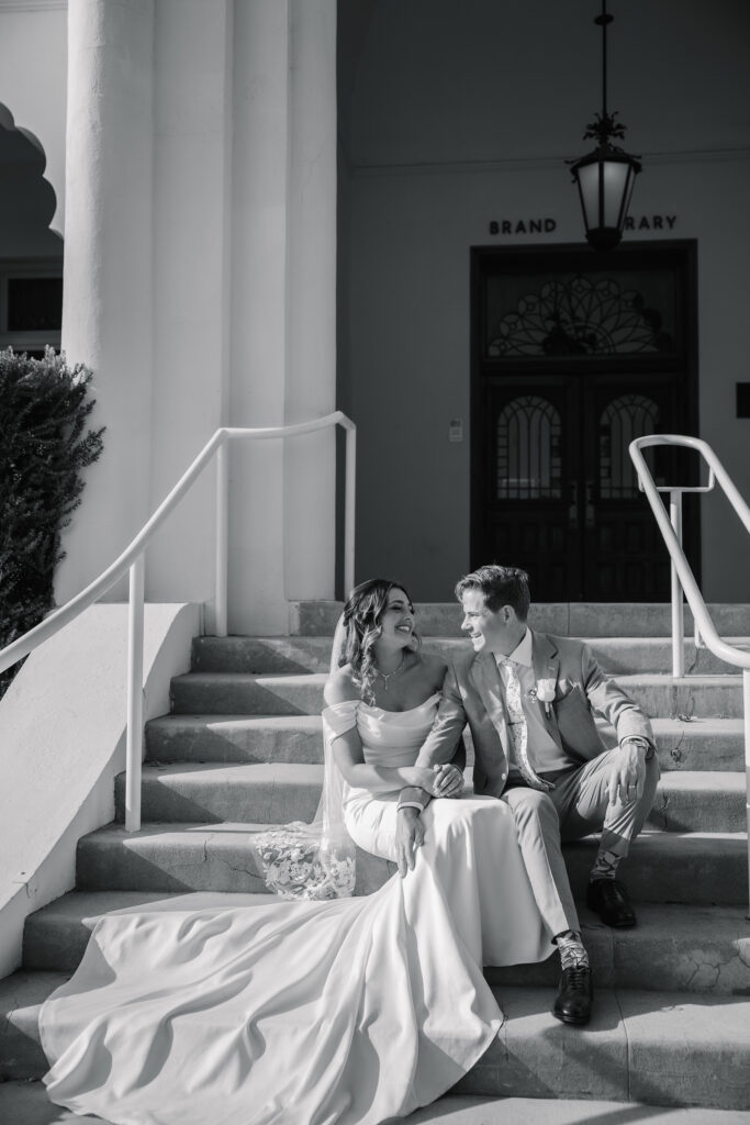 Couple laughing together during their wedding photoshoot