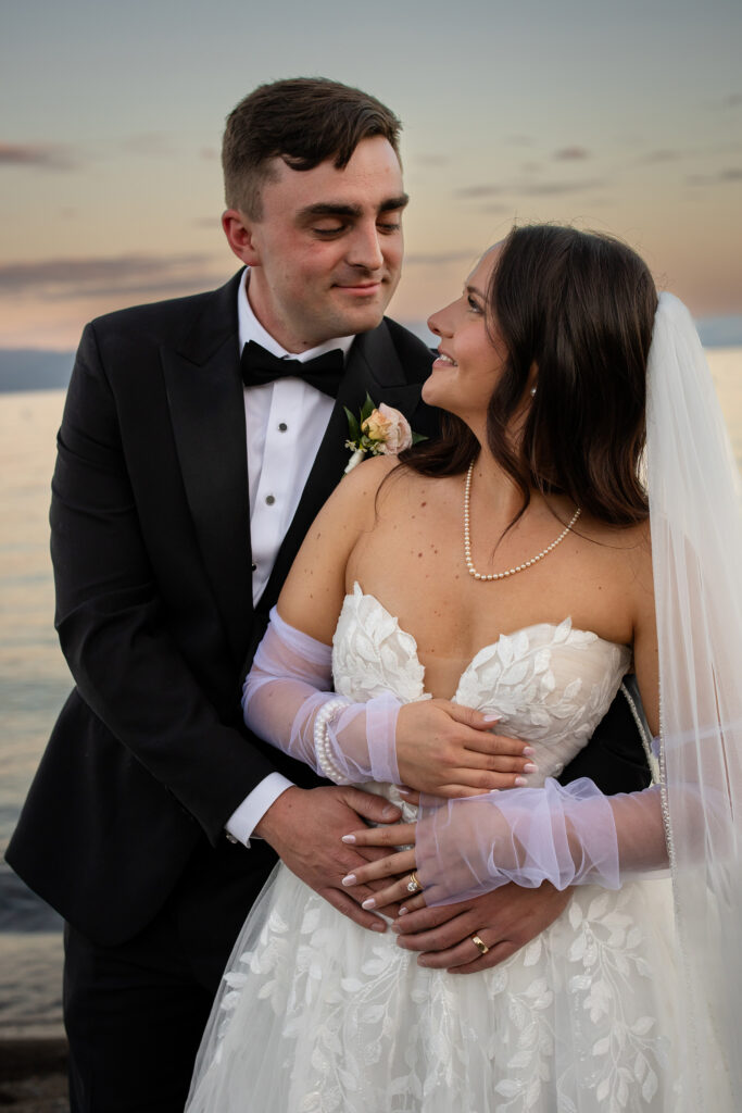 Groom looking at the bride with love and admiration