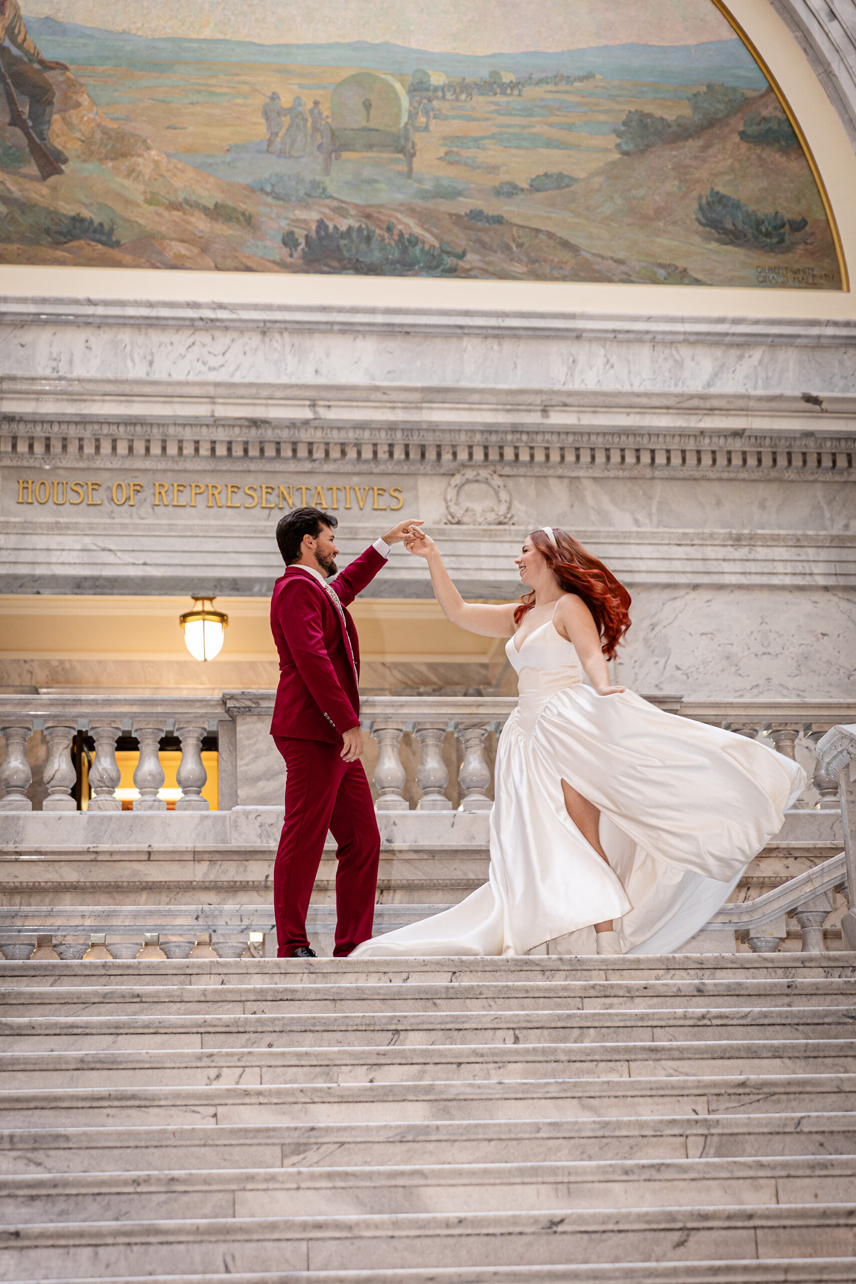 Bride and groom sharing a quiet dance inside the Utah State Capitol — intimate courthouse elopement captured by a Utah wedding photographer.