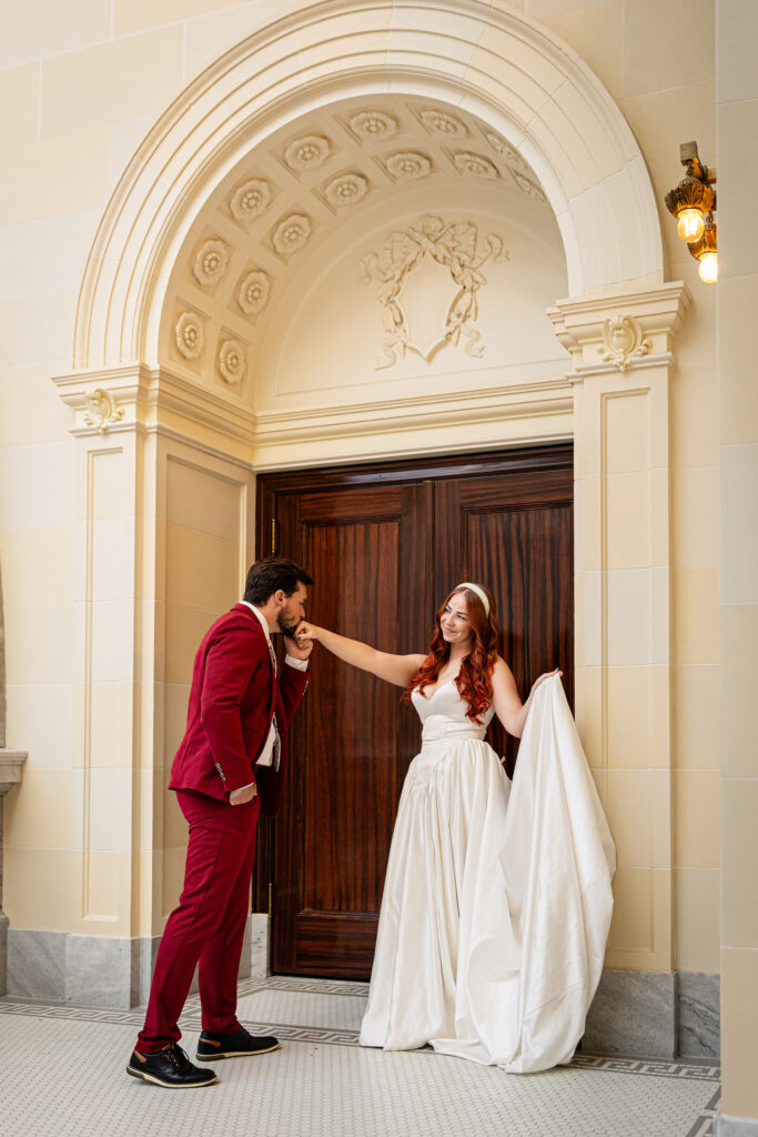 Full-body shot of the couple framed by the Utah State Capitol’s architecture — timeless courthouse elopement.